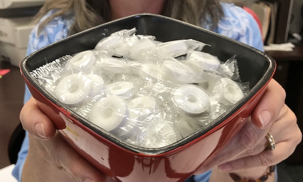 Image of a bowl of Lifesaver mints Christy Harrison keeps on her desk